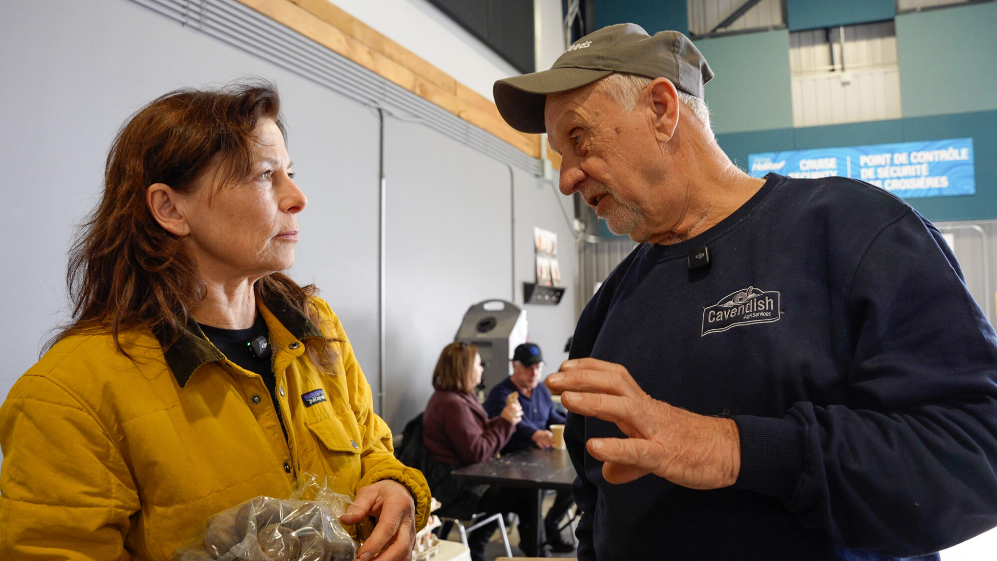 Lil MacPherson and Kevin Graham from Oakview Farms. MacPherson regularly purchases from the family-run business. (Lola Drewery/The Signal)