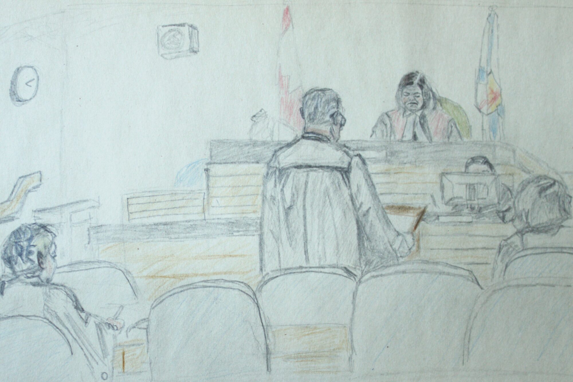 A sketch of a courtroom from the perspective of the audience. The back of a lawyer speaking to a judge is visible.