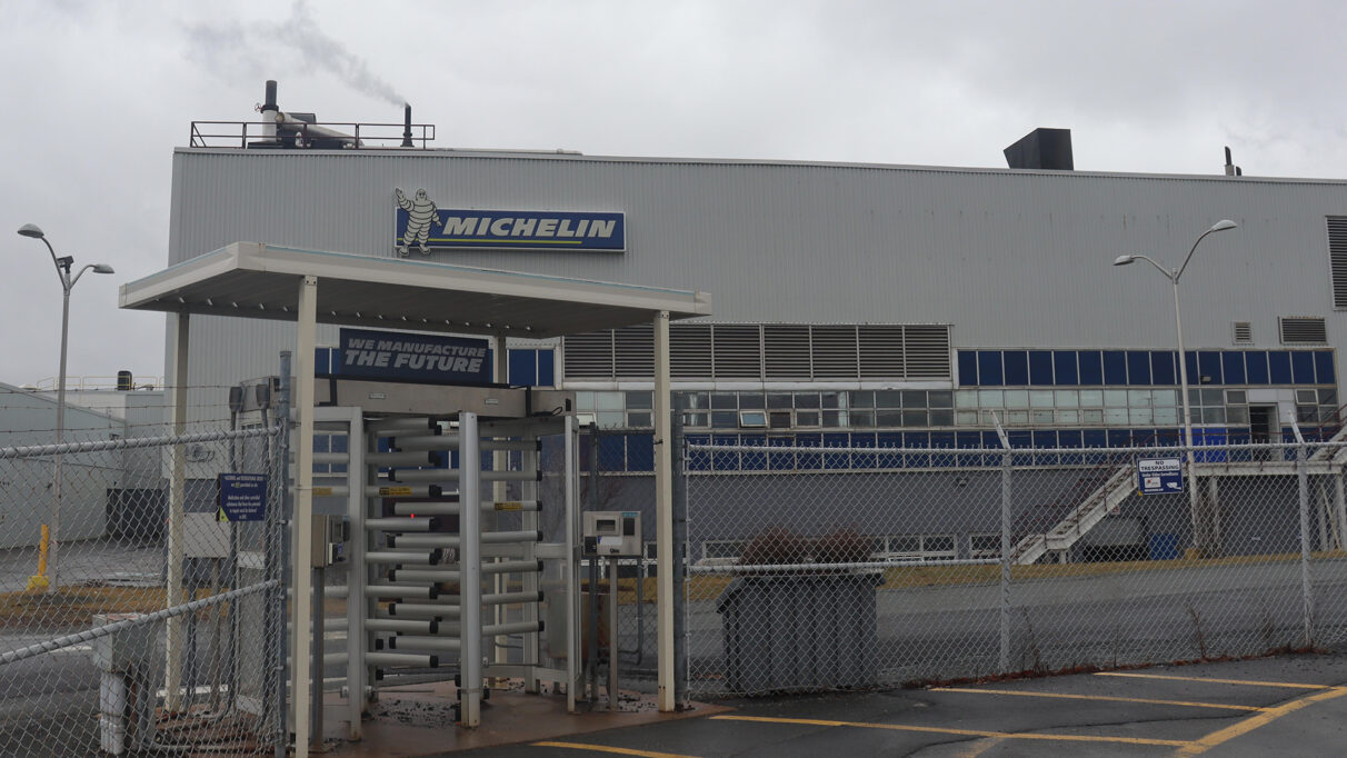 The Bridgewater Michelin factory gate, with a sign saying We Manufacture The Future above.