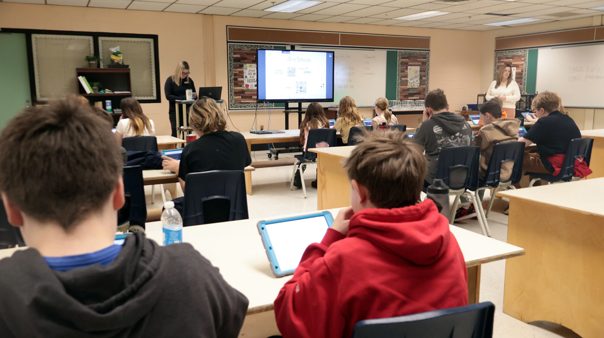 Students listen to Tara Earle during their AI lesson at Riverview Middle School in Moncton, N.B. on January 23, 2025.