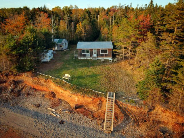 An aerial shot of a cottage.