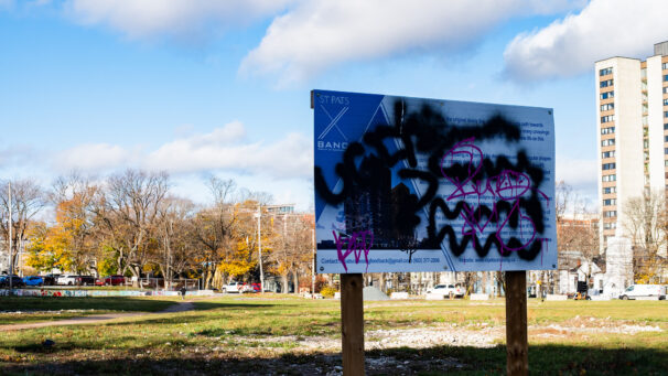 A proposal notice covered in graffiti.