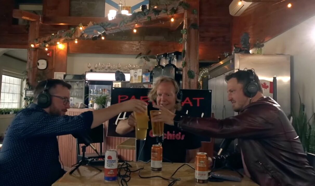 Mike Tobin (left) and Matthew Conrad (right) interview Jonathan Torrens (centre) in Tatamagouche Brewing, a bar in Tatamagouche, N.S. in an Afternoon Pint episode released on YouTube Sept. 2, 2025. The co-hosts interviewed Torrens about his roles and experiences in the Canadian entertainment industry.
