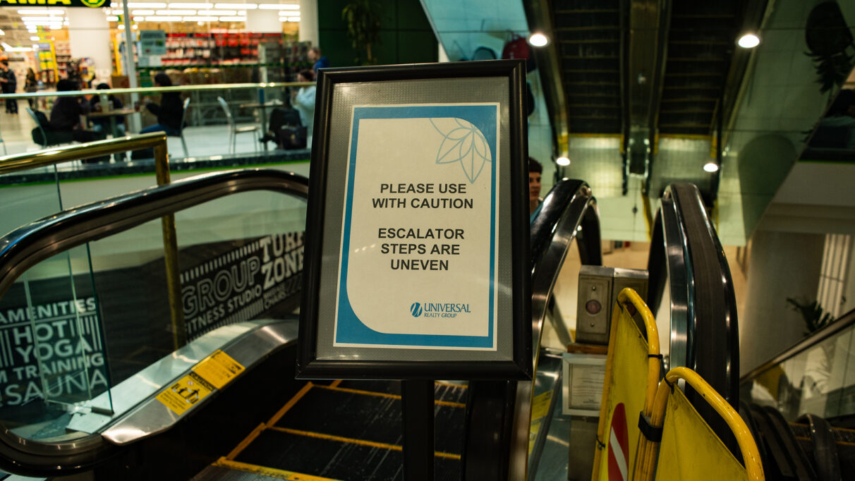 Warning sign for the out of service escalator inside the Park Lane Mall.