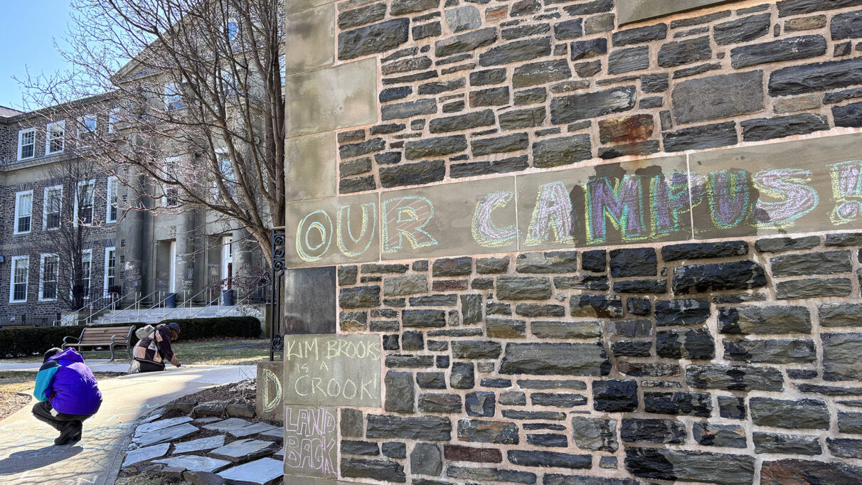 Student strikers write messages in chalk on the walkways and walls of Dalhousie University’s Henry Hicks building in Halifax, Nova Scotia on March 18, 2026. Students from several Halifax universities gathered on Studley Campus quad for a rally on the third day of the Nova Scotia Student Strike.
