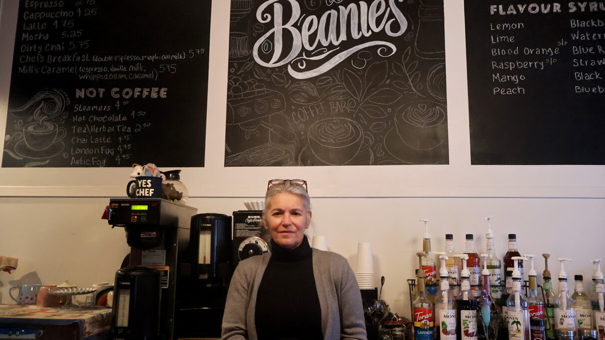 Tammie Vautour standing behind the counter at Beanie's Bistro.